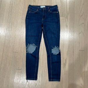 Free People dark wash jeans with holes in knees